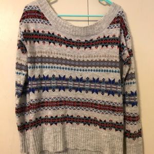 Beige boat neck sweater with colored designs